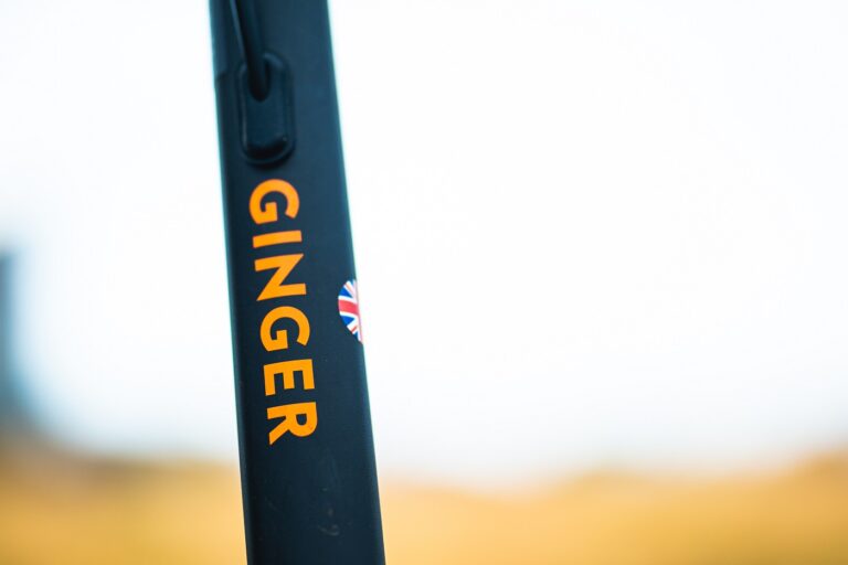 The handlebar stem of a Ginger e-scooter