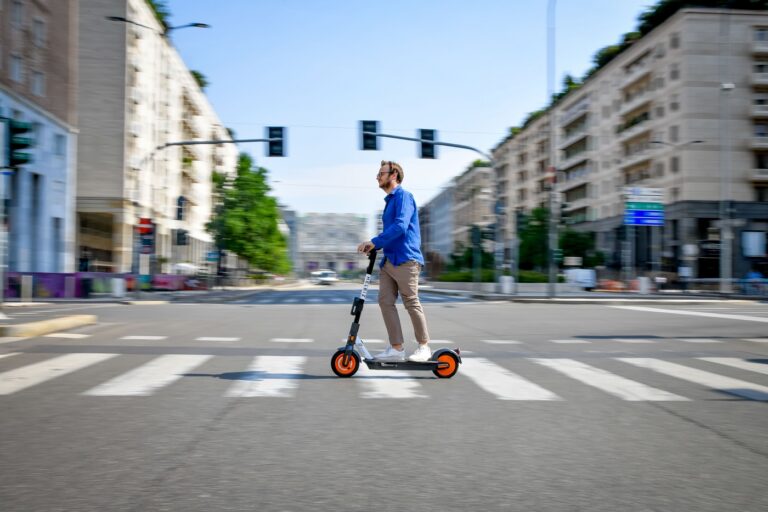 Helbiz scooter being ridden in MIlan, Italy